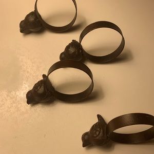 Set of four bird napkin rings.